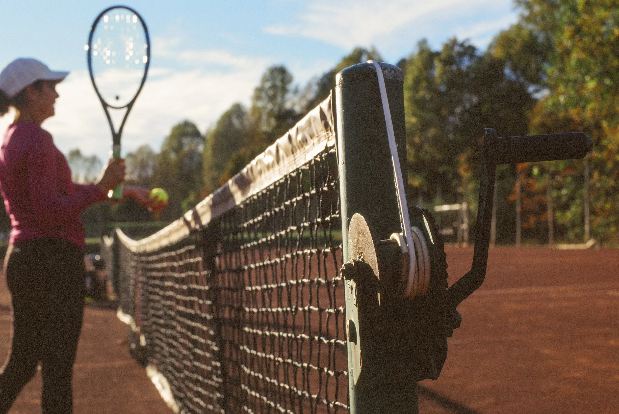 women-tennis-racket-court-usta-red-clay-net-patrick-fraser.jpg