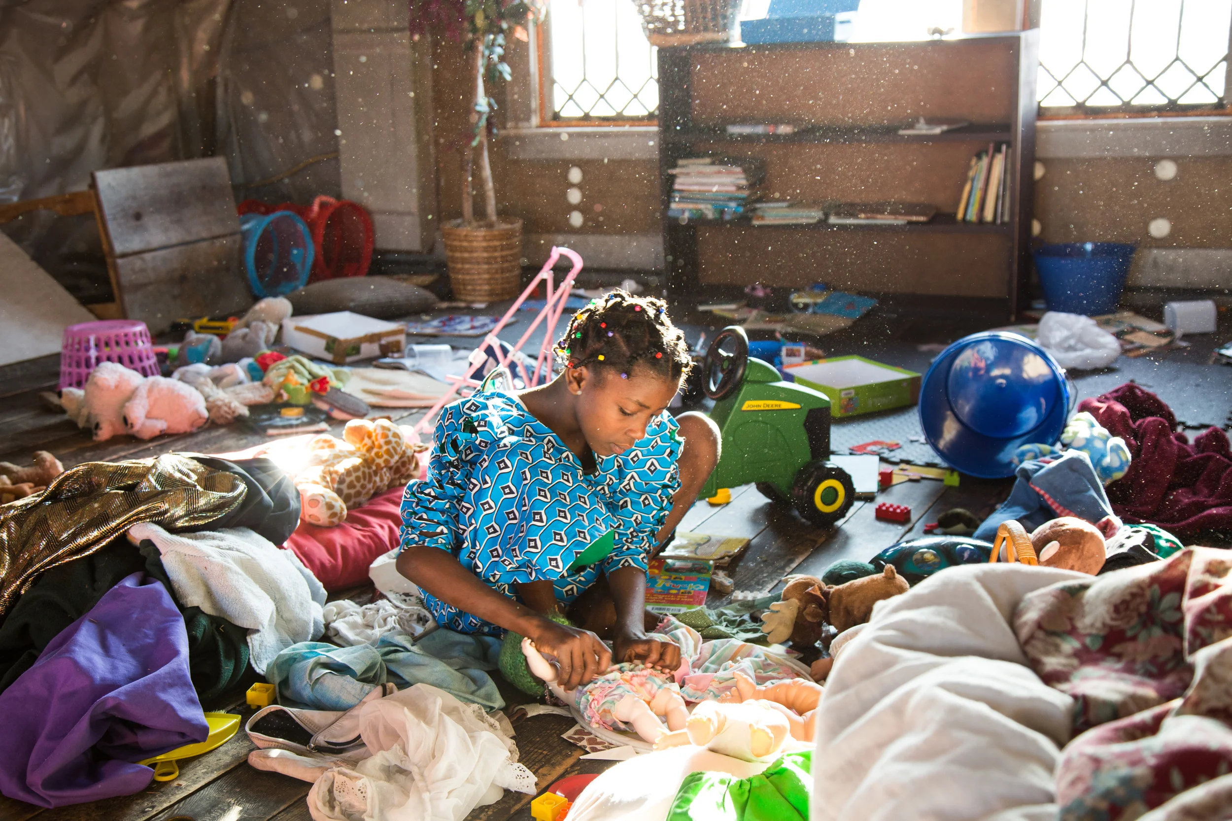 Our neighbor, D, plays with the Swift kids in their magical attic - a space that births creativity and imagination.