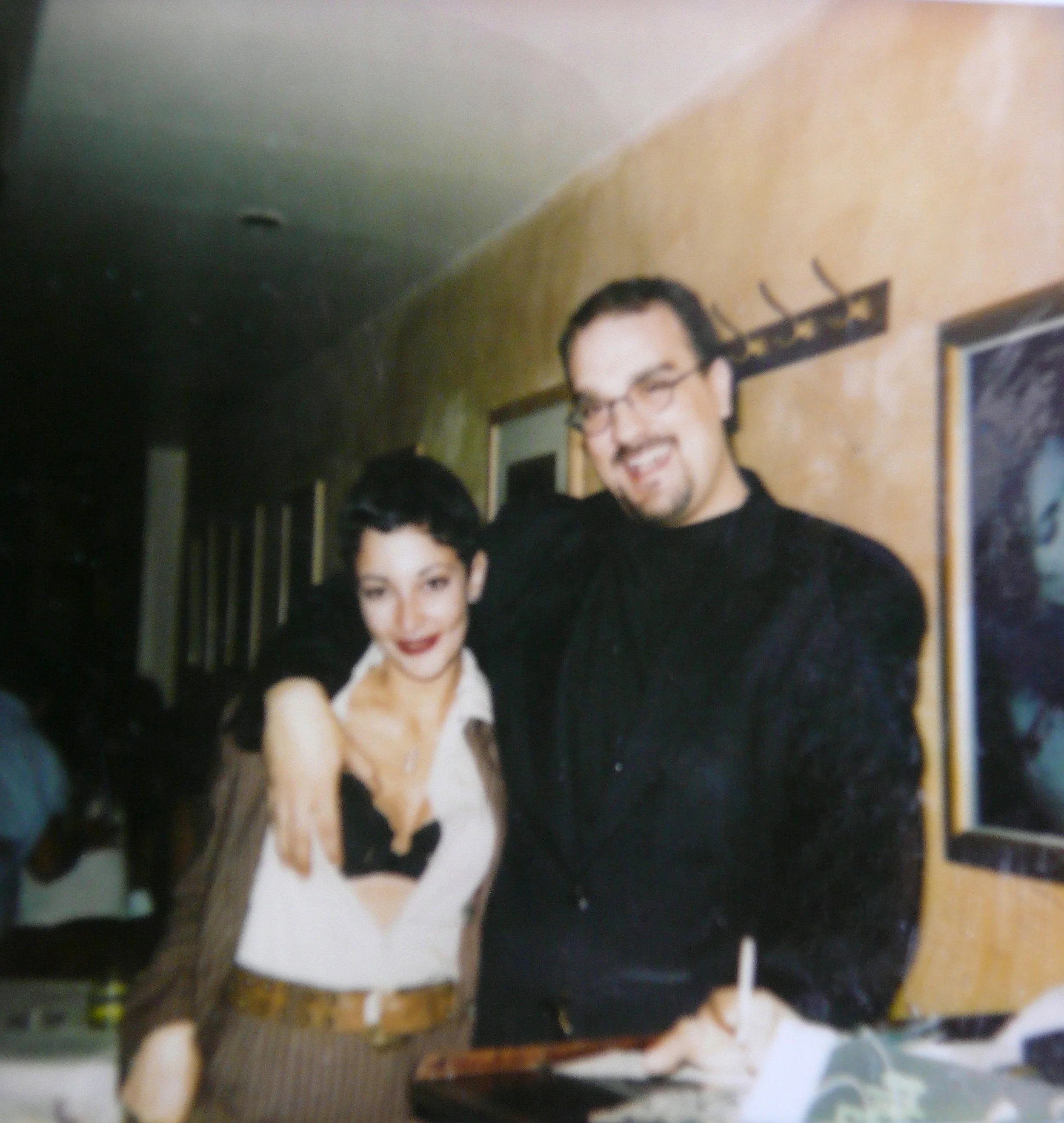“Event co-creator Wanda and restaurant manager Roy P. I am wearing the Italian pinned striped suit with sexy lingerie. We were all playing with the Male/female Butch/Femme fashion style of the ‘90's lesbian scene.” - Wanda Acosta, 2018. Image courtesy of Wanda Acosta