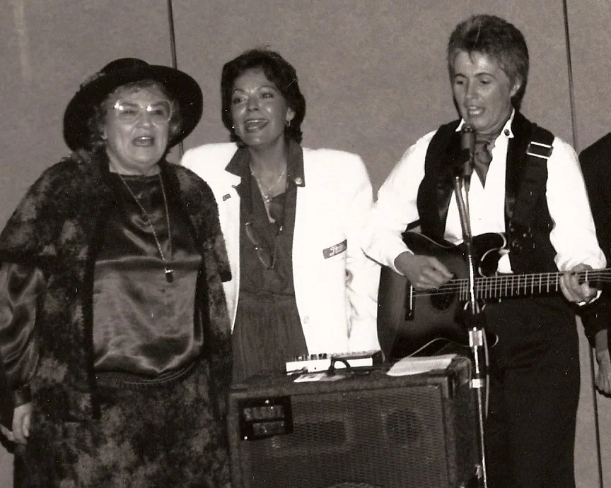 Left to Right: In 1992 Congresswoman Bella Abzug (D-NY) joined former NOW-NYS President Marilyn Fitterman and Sandy Rapp in Rapp's "Remember Rose: Song for Choice.” Image courtesy of Sandy Rapp.