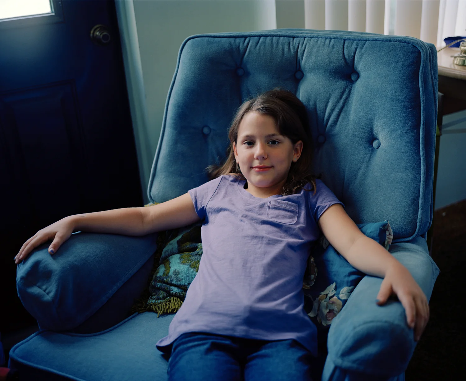 Carmen in chair.jpg