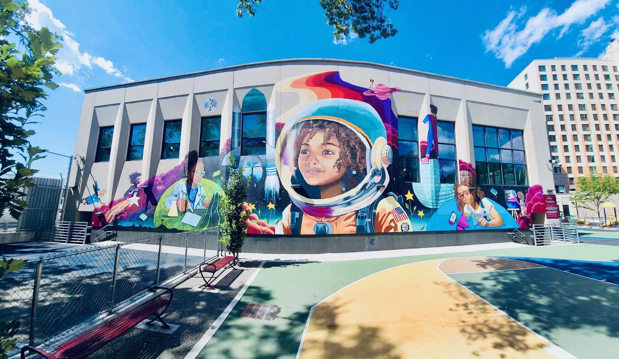Groundswell Community Mural Project, Voices Her'd: The Sky Isn't the Limit (c) 2023. Lead Artist: Kristy McCarthy, Assistant Artist: Eva Mariscal, Mural Site Assistant: Melanie Garcia.