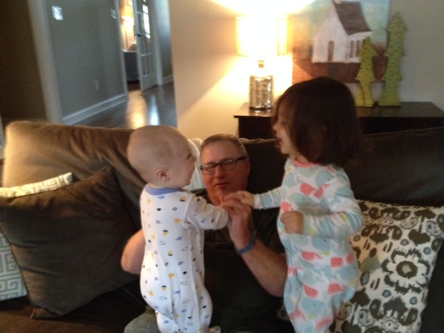 Jumping on Poppa - I can just hear the squeals of laughter in this picture!