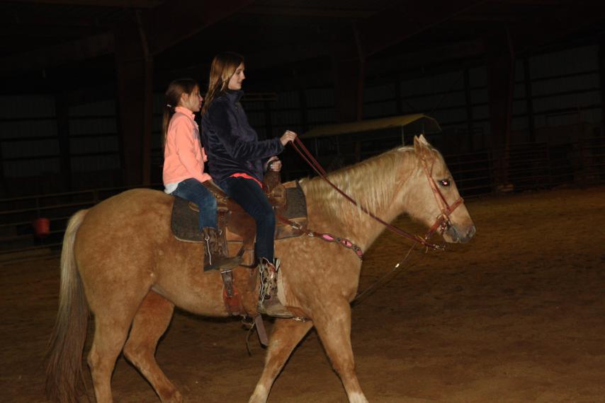 These girls - Roany and Gracie - are like pros compared to us. Roany isn't even on the saddle!