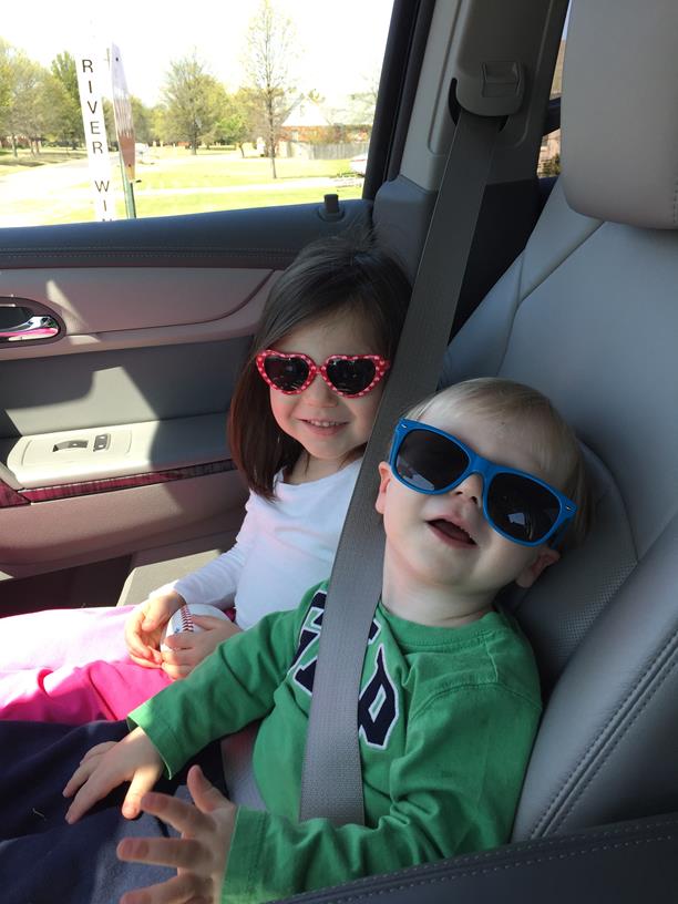 Riding shotgun in shades (don't worry, we just went around the corner!).