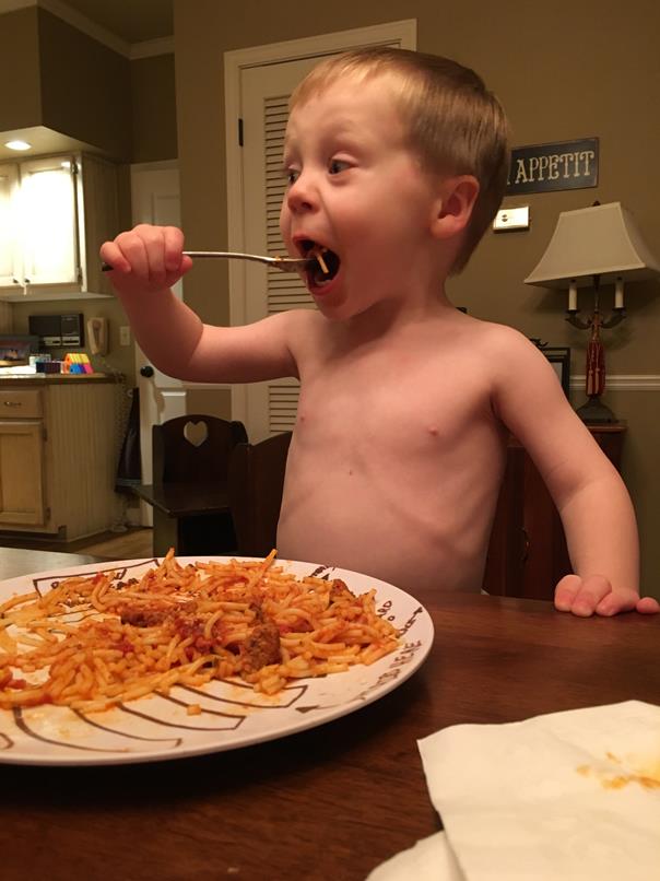 This boy can put away some spaghetti but the carbs don't stick to his ribs!