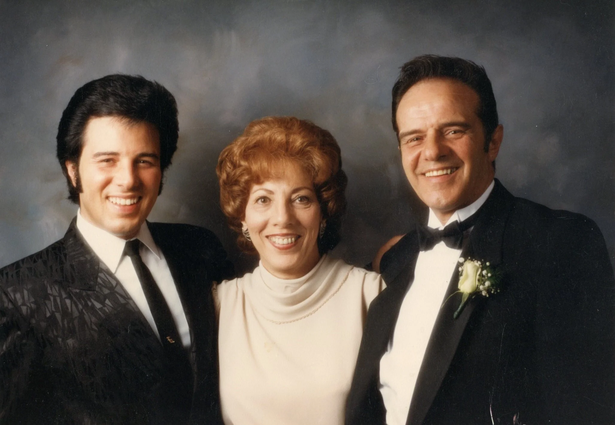 Tony with his Mom & Dad ...studio portrait. sometime in the 90's.