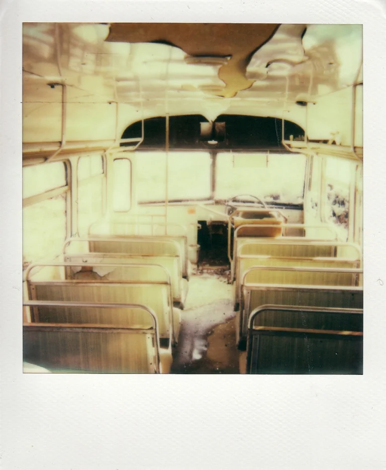 An abandoned bus - a bit more detail evident due to the general low light. Still, see how the windows are just completely white.