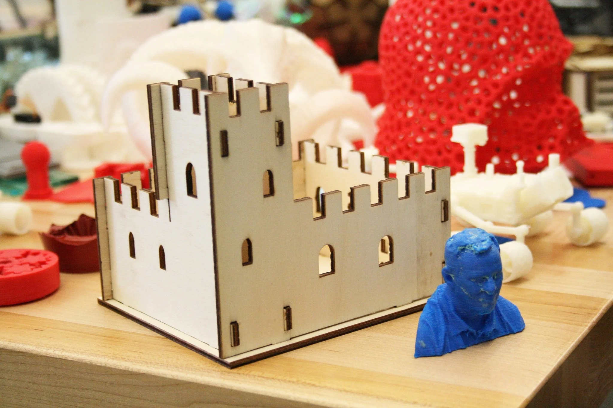 Laser cut castle and 3D printed busts.