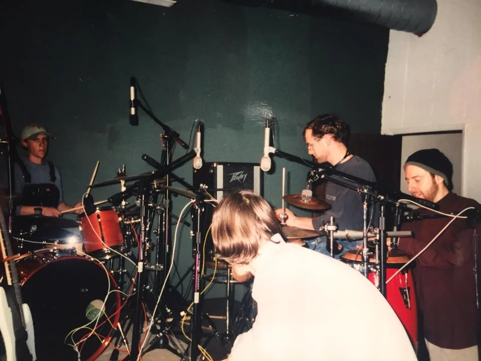 Chuck Morris and Mike Greenfield standing next to each other on the right side of the photo
