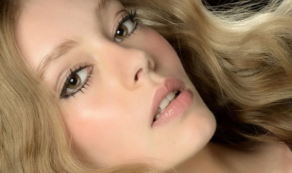 The classic black liner and mascara paired with minimal skin.