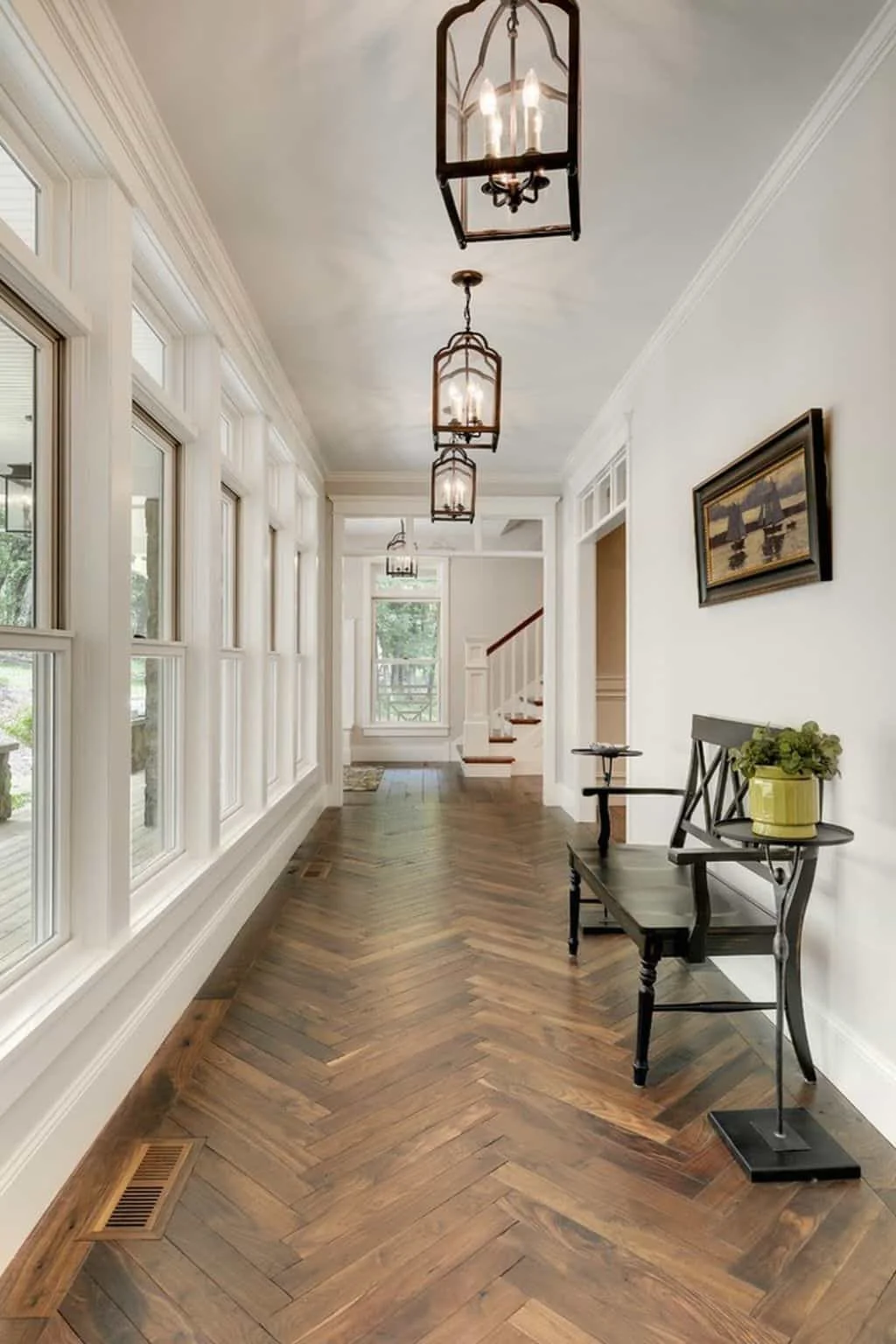 hallway-with-neutral-wall-colors-and-herringbone-wooden-floors.png.jpeg