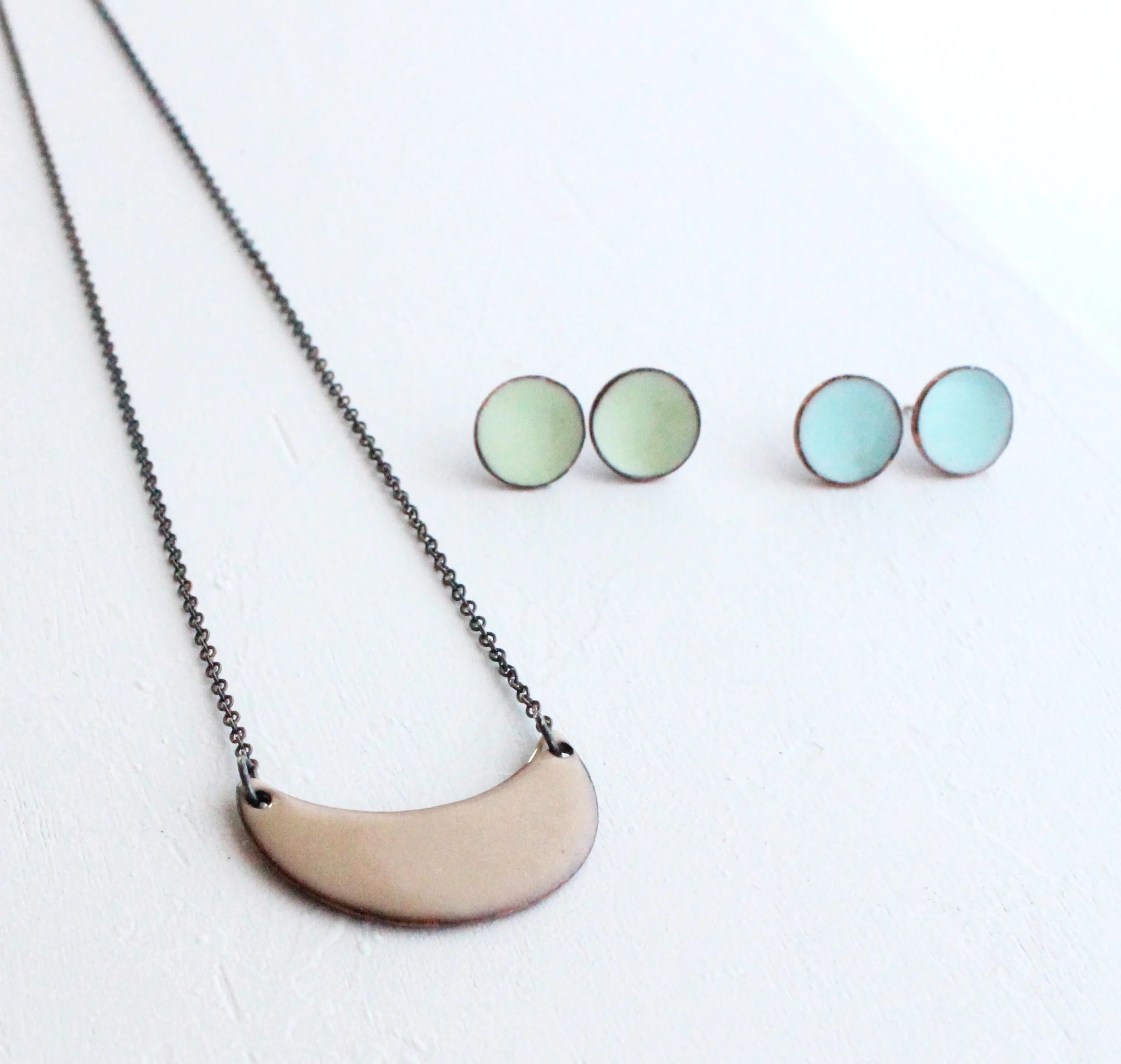 This buff necklace pairs with anything. As do the light enamel post earrings. I wear my own pairs constantly. 