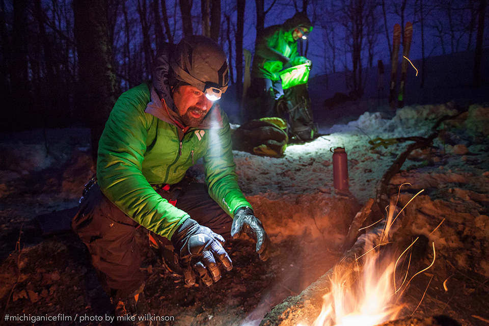 Jon warming himself by the fire after spending a few hours exposed to the sub zero winds coming off of the lakeshore.