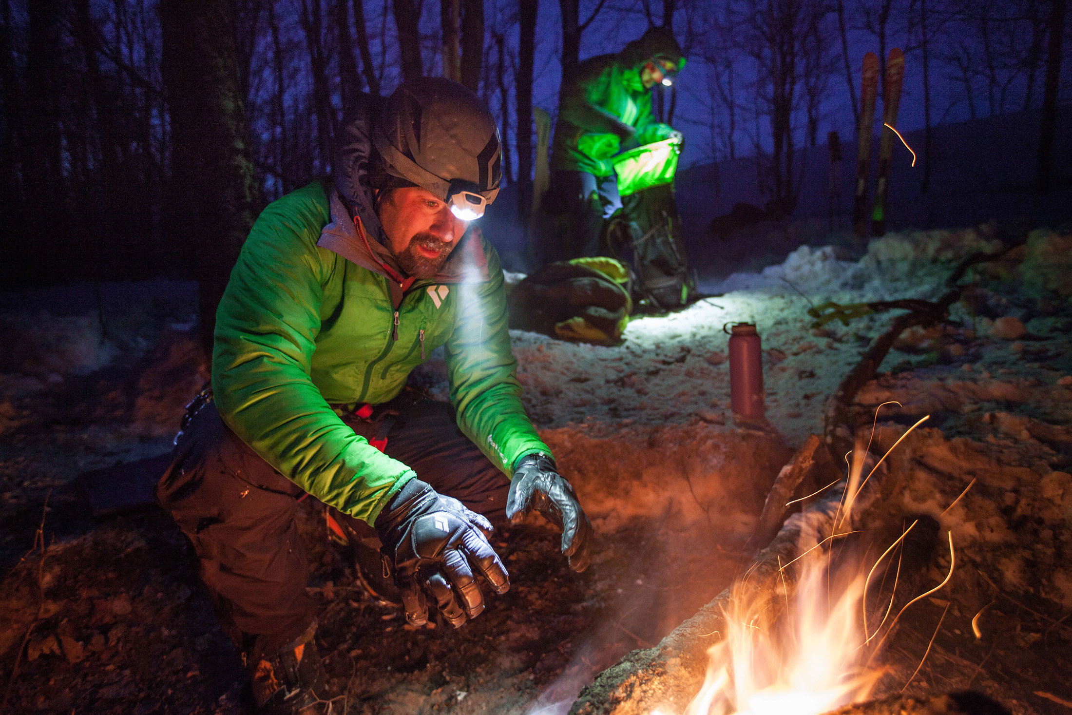 Jon Jugenheimer thawing his hands after a long day in sub-zero temperatures along the shores of Michigan's Lake Superior.