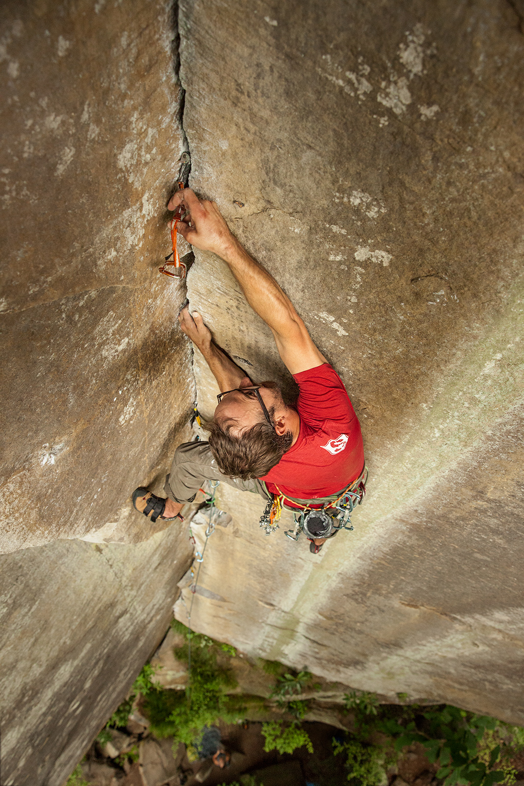 Adam Brusven looking to get a placement before reaching the anchors of "Tradisfaction" in the Red River Gorge.