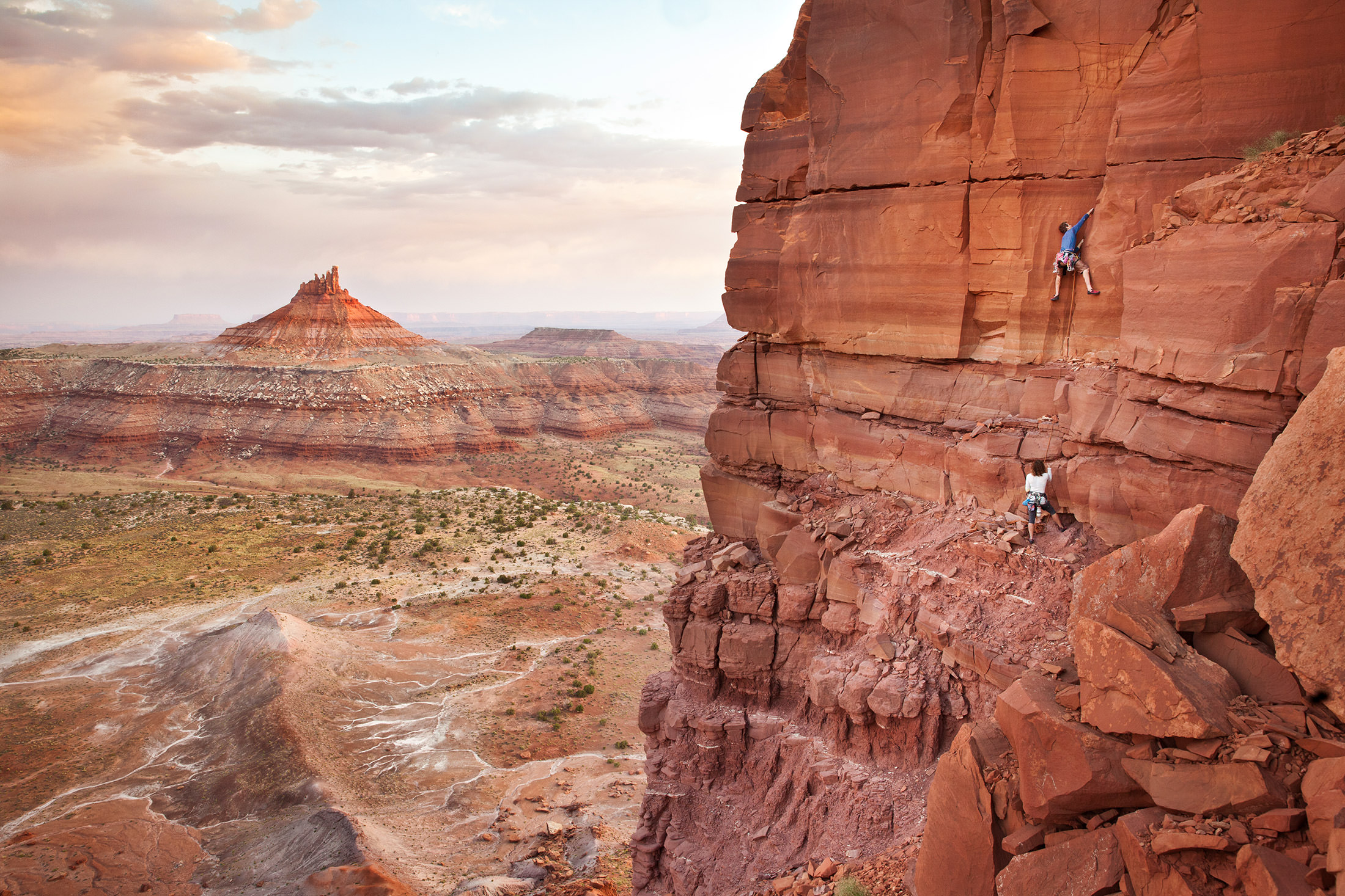 Rock climbers begin their ascent of the first pitch on the South Sixshooter at Indian Creek in Utah.