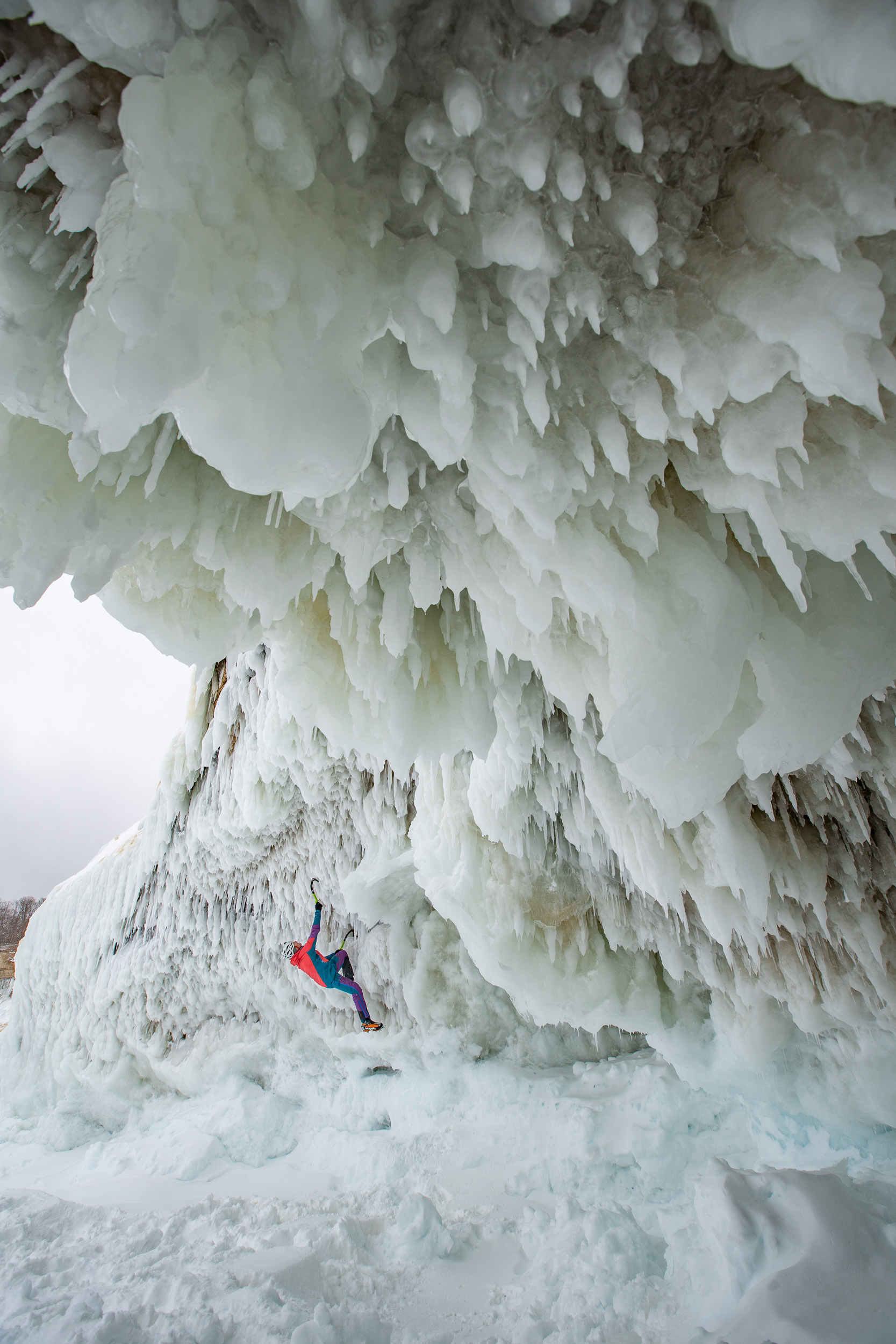  Tim Emmett ice climbing through a steep ice cave, formed on the shores of Lake Superior in Michigan. 