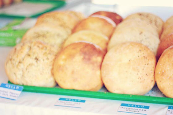 dukes bread lined up at the farmers market