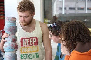 Collective members working in the studio.