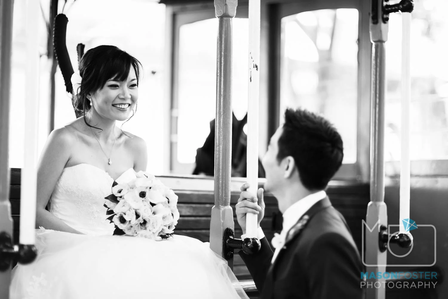 bride + groom on cable car , wedding photography at the westin st. francis in san francisco