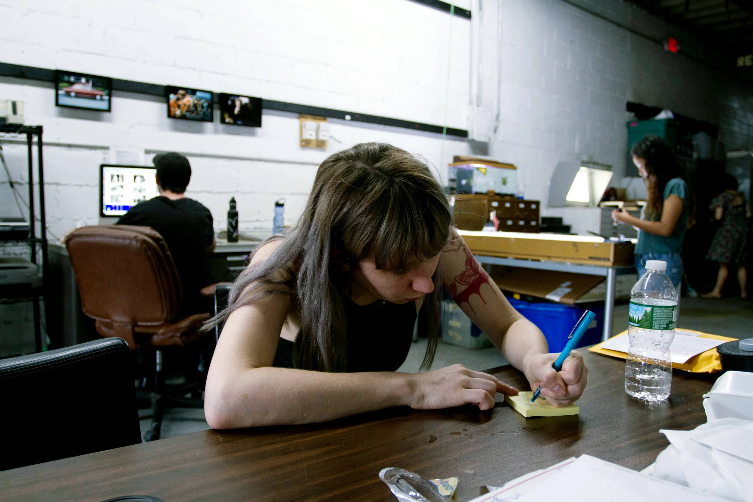 Volunteer Abi takes notes