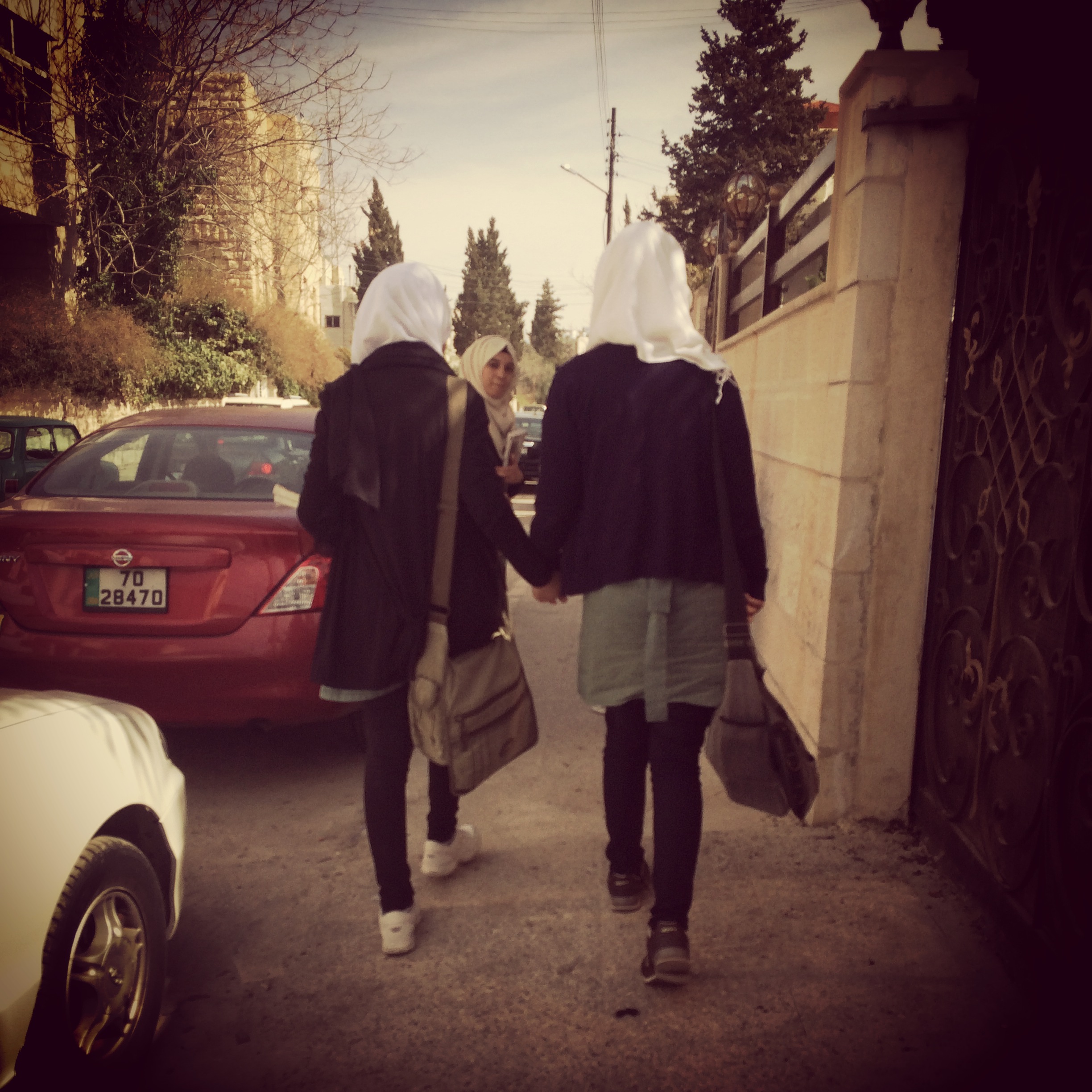 Walking home from work on my last day behind these school girls. They held hands the entire time. This is how I think of the Middle East. 