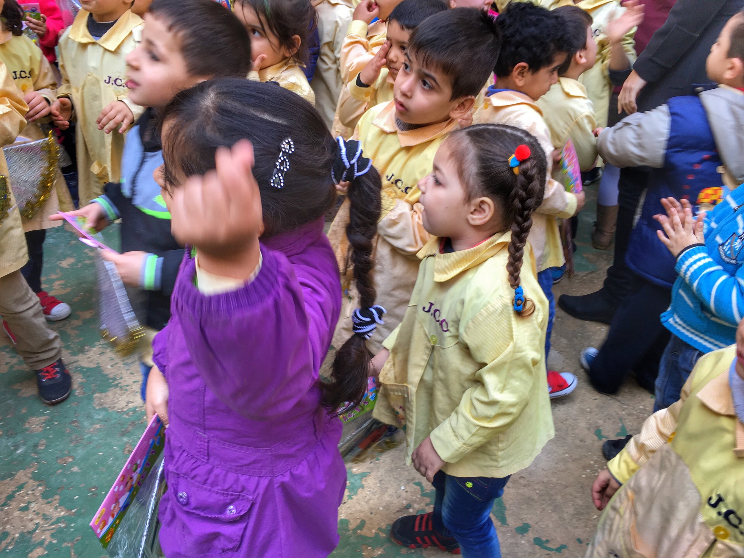  Palestinian refugee children dancing at a party at JCC Sabra Center in Sabra, Beirut, Lebanon. December 2015.
