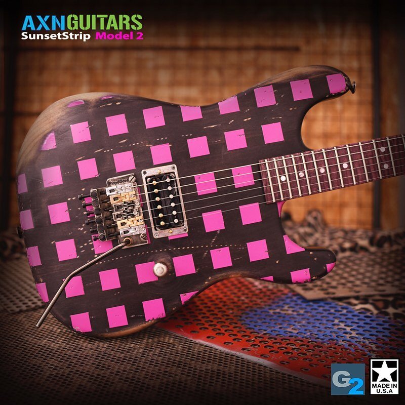 The @axnguitars SunsetStrip Model 2. This AXN had a maple flamey fretboard. I've done the neck in purple just to get a little more creative. It has a two piece center joined alder body with my checkerboard design.
Learn more at AXNguitars.com

#custo