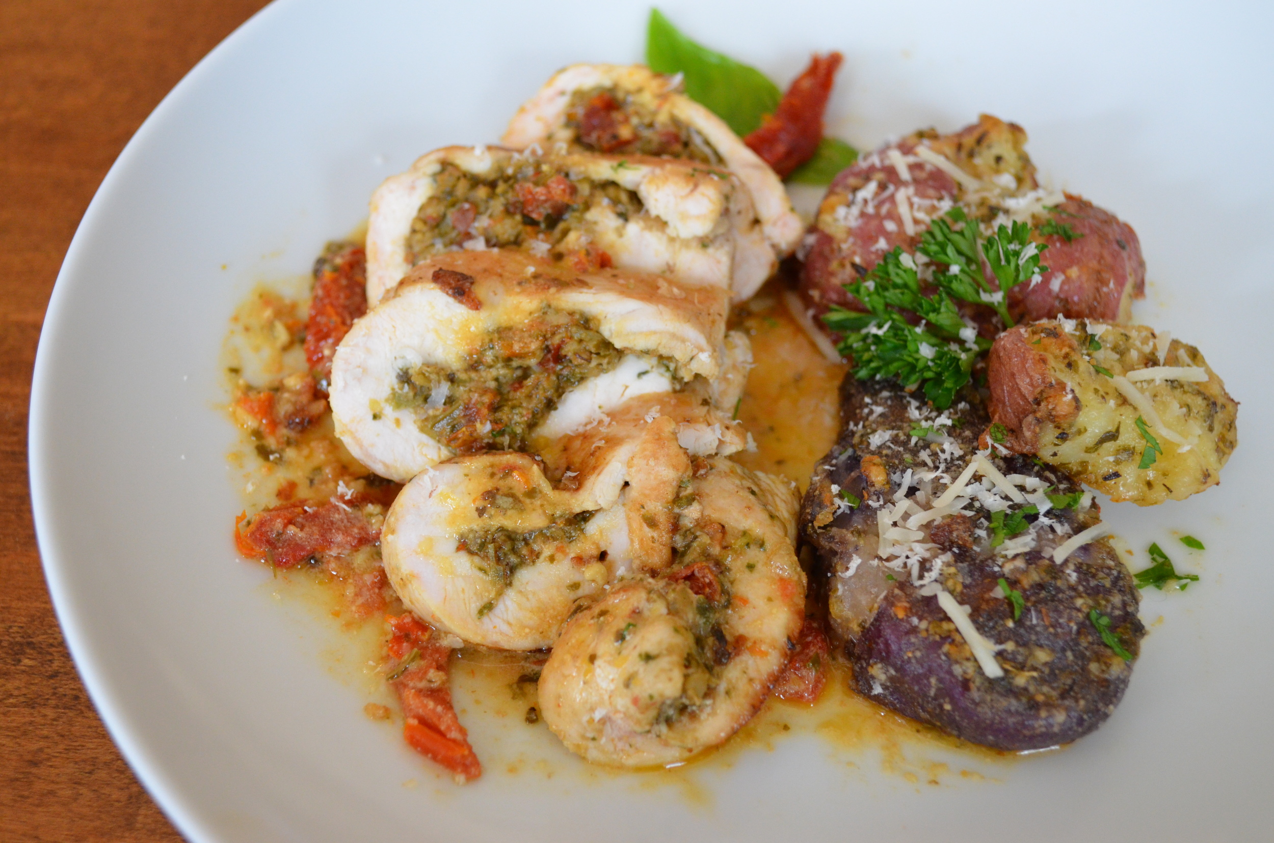 Pesto and Sun Dried Tomato Stuffed Chicken with Herb Smashed Potatoes