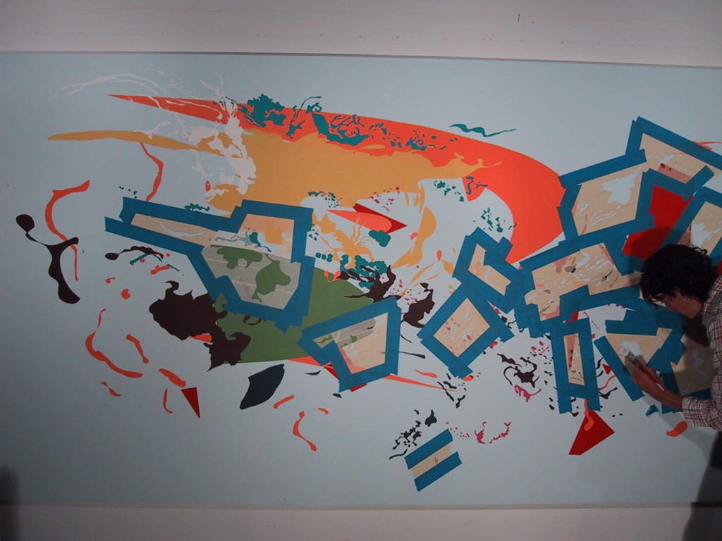 Julie Mehretu painting in the barn studio.