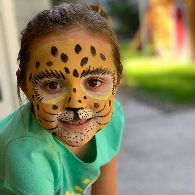 My first attempt at face painting. Cheetah Lillia approves. She said we should start a stand tomorrow in the front yard and sell face painting for $1. #GunnaBeRich #cheetah #facepainting