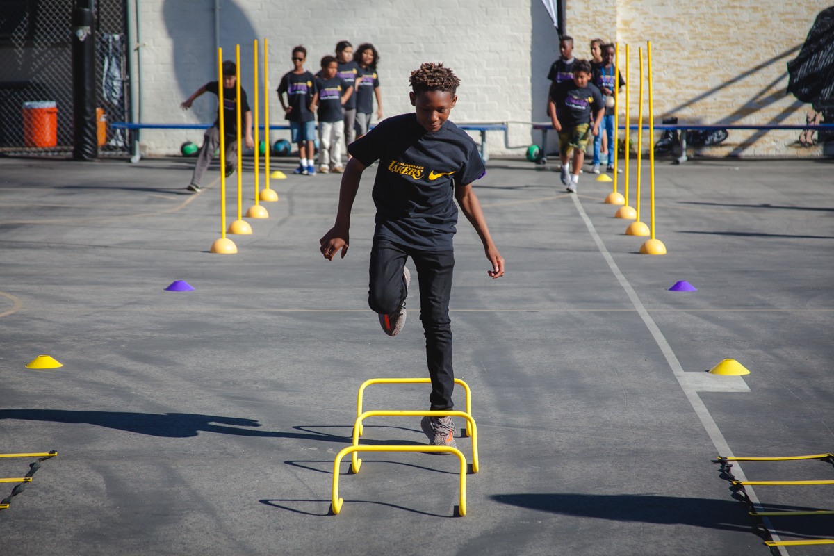 Club kids running drills at the Lakers Health & Fitness Camp, 2017.