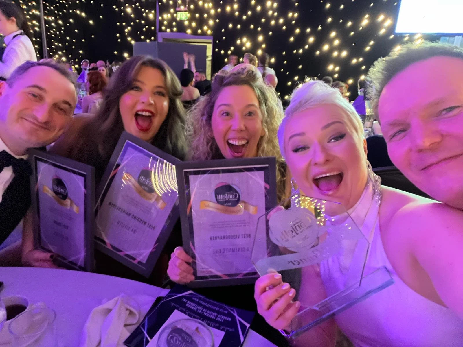group of award winning wedding photographers and videographers at scottish confetti awards 2024, including highly recommended best wedding videographer in Scotland, A Cinematic Life.