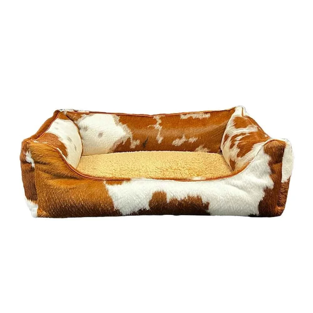 brown white cowhide pet bed