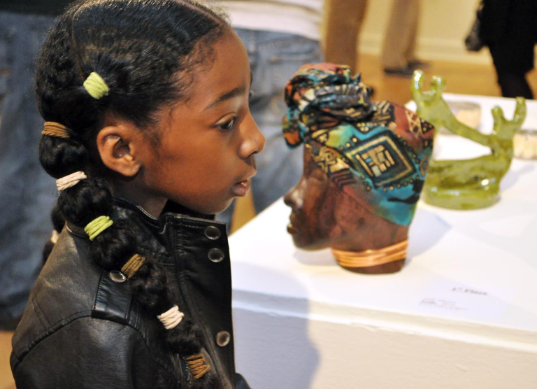  She is the perfect accent to this piece. ( photo taken by Mr. John Oubre)  