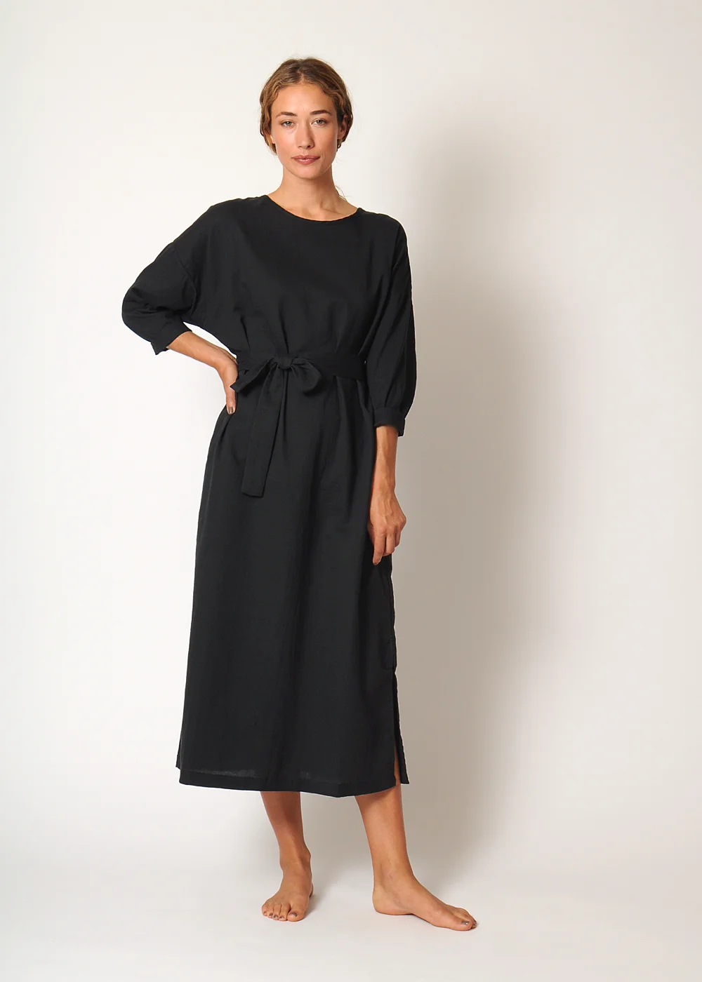 conifer_pullover_dress_blk_armup.jpg