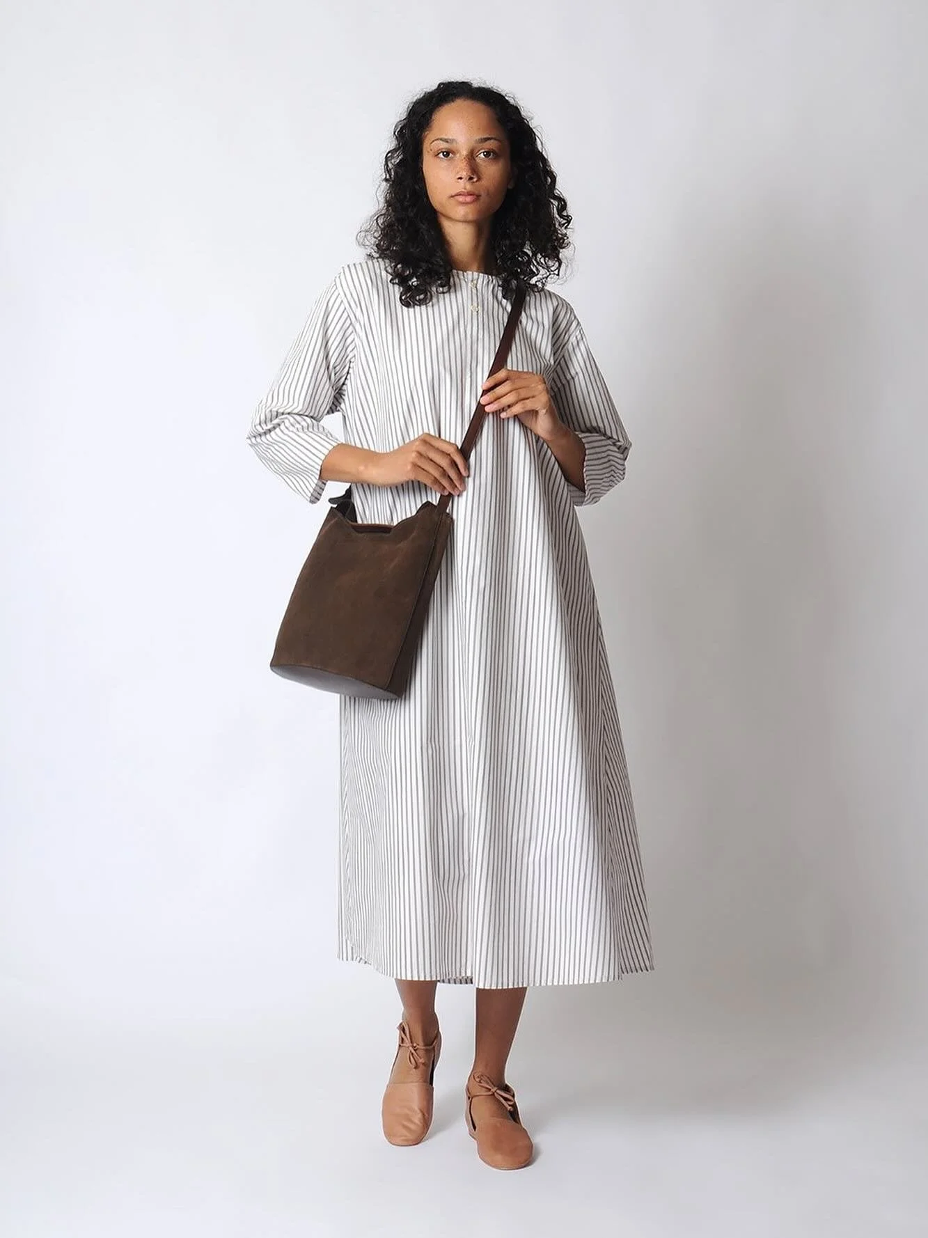 @miithaaii dress with suede @ilbisonteofficial bucket bag and @birdofflightshoes Amelie flat 🥰