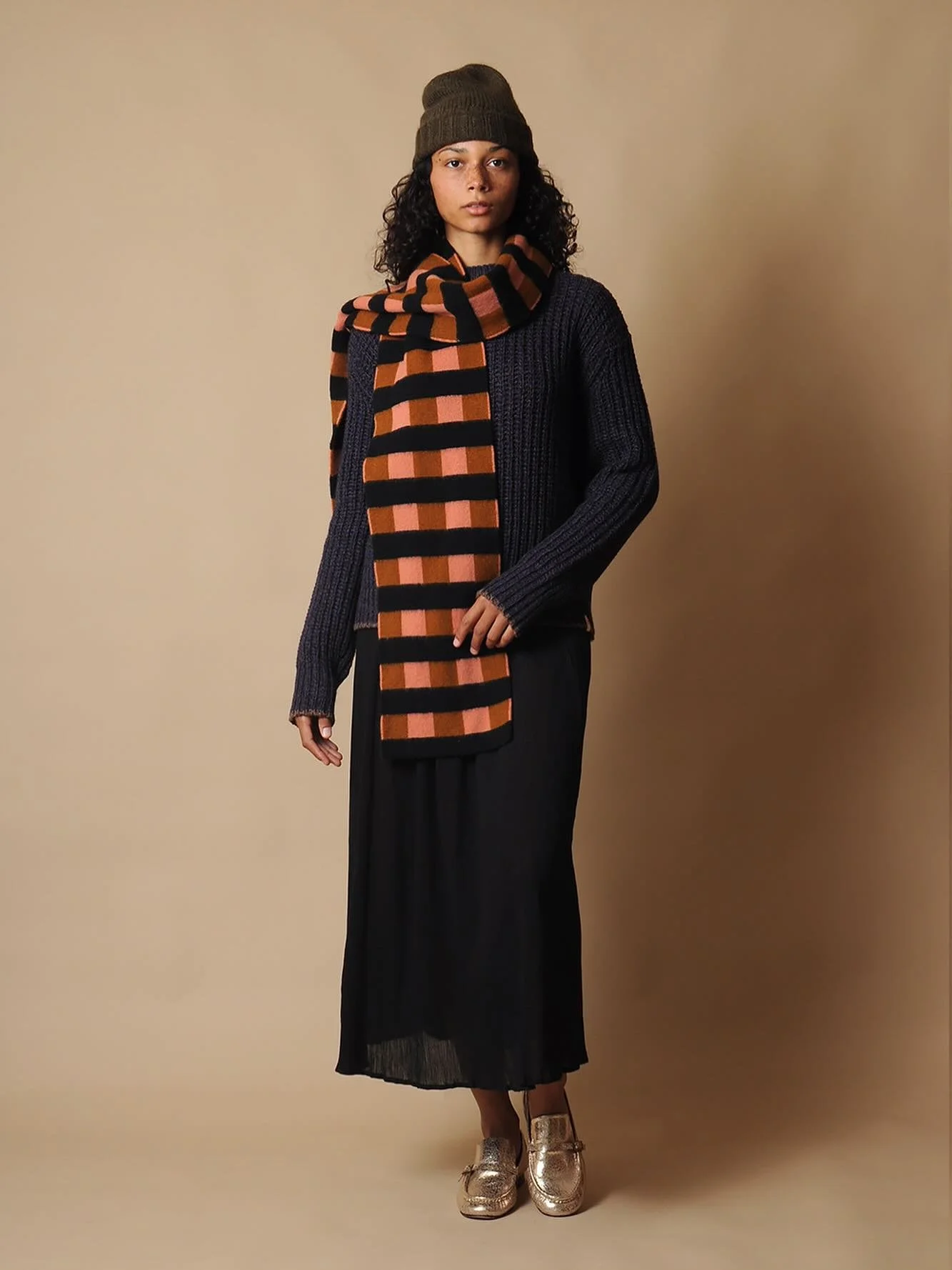 Outfit available at our brick &amp; mortar in Fairfax and online conifershop.com 
@megcohendesign flat knit hat
@moismont sweater 
@jogordonknitwear scarf
@miithaaii skirt

@shopeitheror gold loafer SOLD OUT ✨