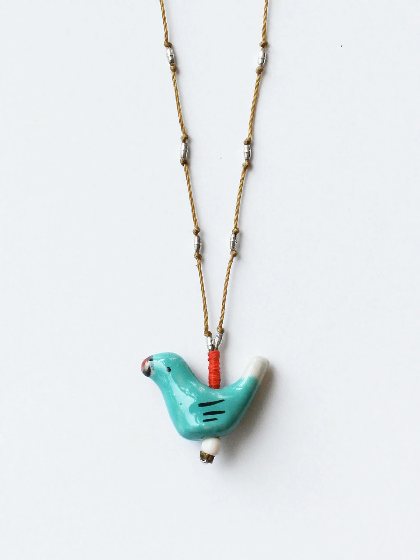 New @seerealflowers ceramic bird necklace 🥰