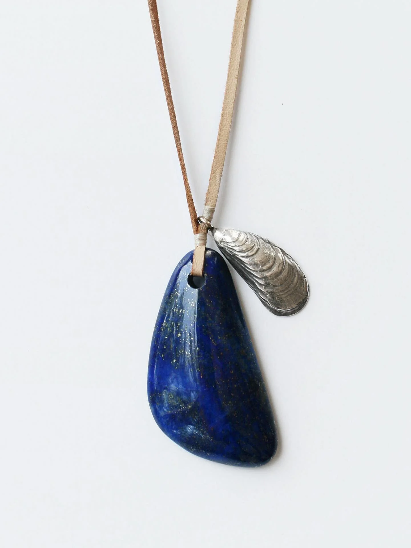 @seerealflowers large lapis pendant with a cast sterling silver mussel shell 😍