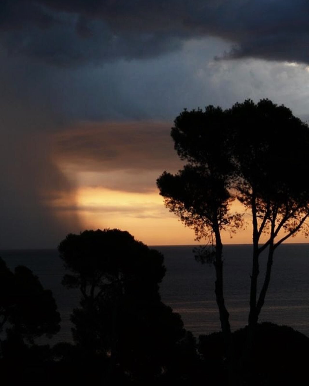 Sunrise with the rain falling onto the sea yesterday
I 💛 the second picture with three different points of sunlight in between the darkness of the clouds, the dusk rain falling and the ebony black landscape as it was still early.
Which one is your f