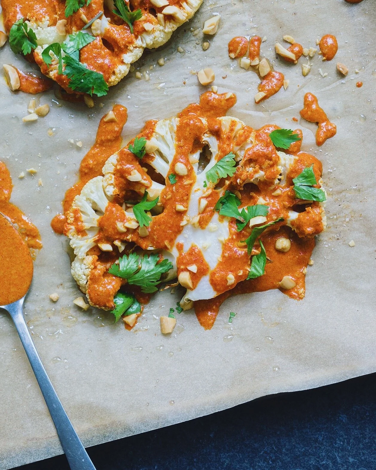 Cauliflower Steaks with Red Curry Peanut Sauce
