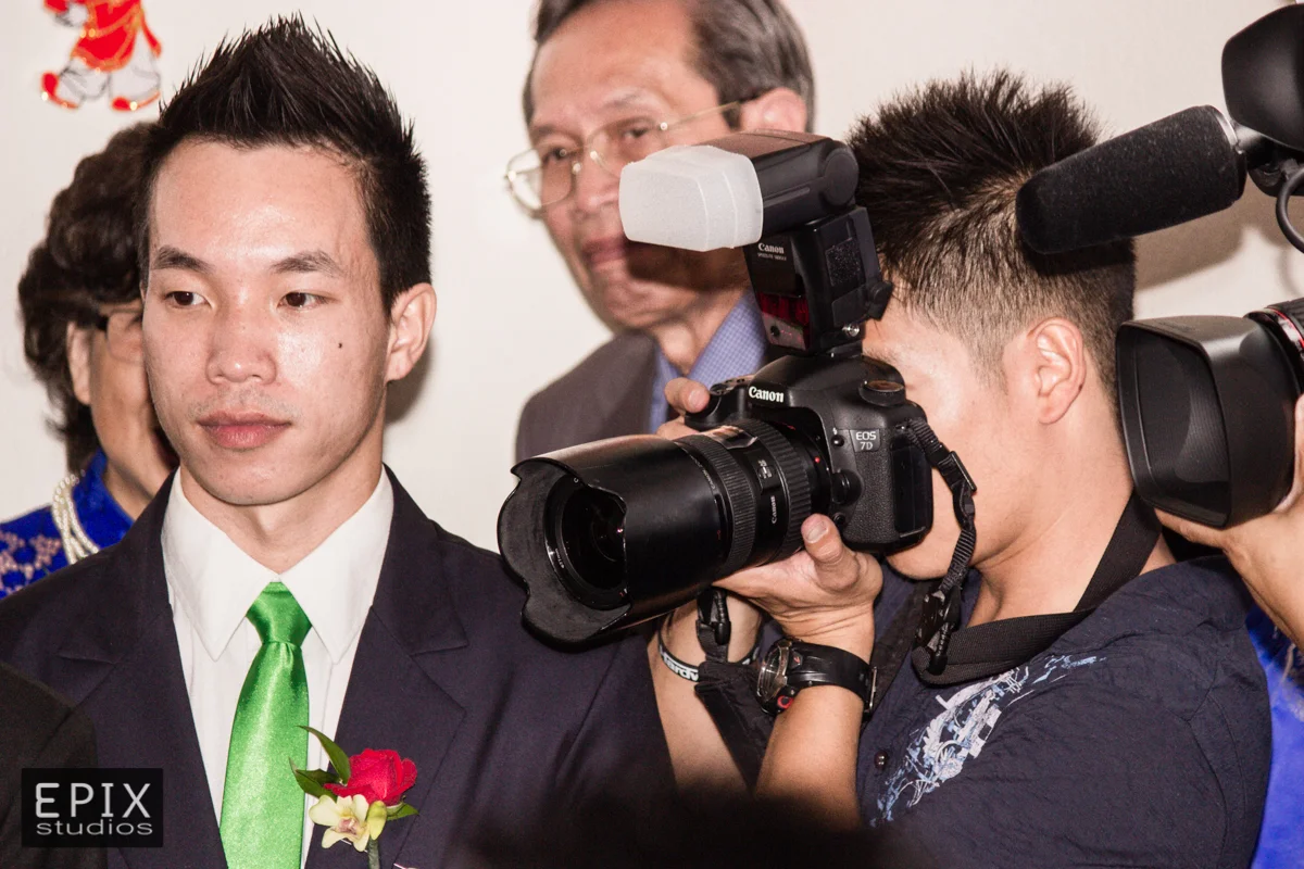 Shoving people out of the way to capture that perfect image, one client at a time