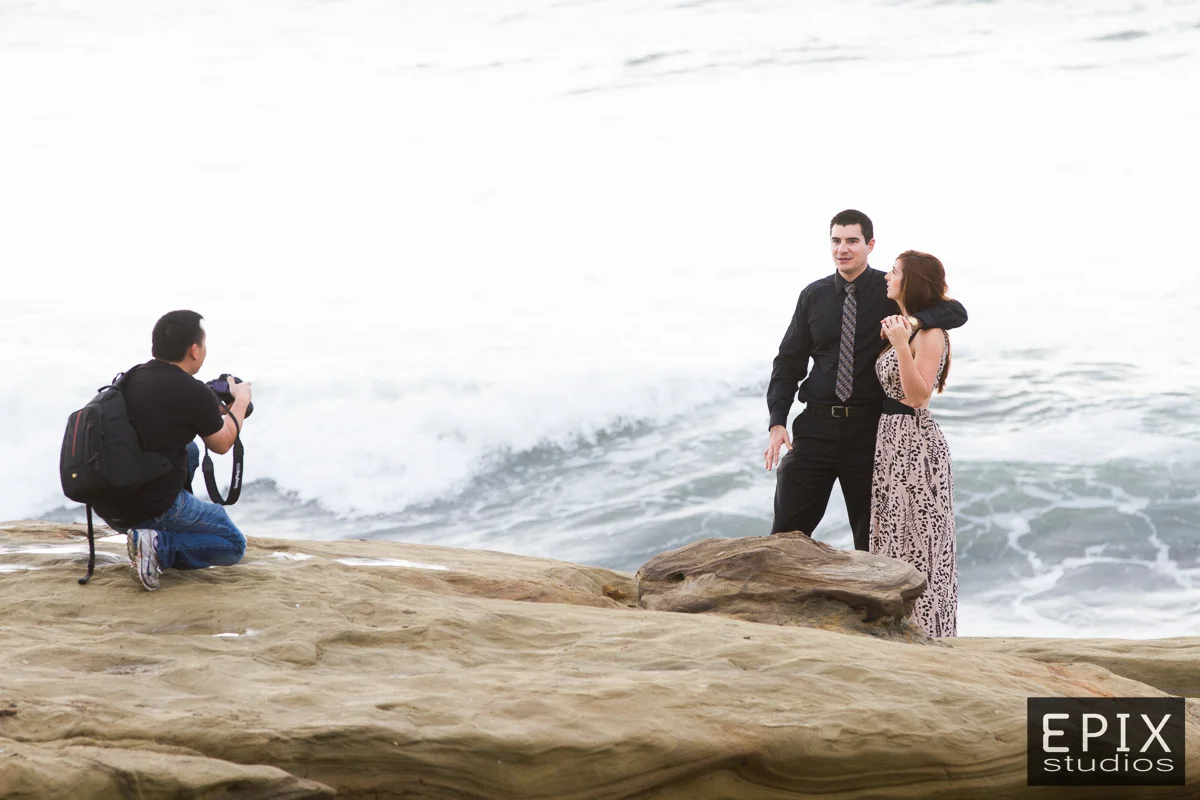 "Ok, we are going to wait here and then when the waves come crashing in, smile!" 