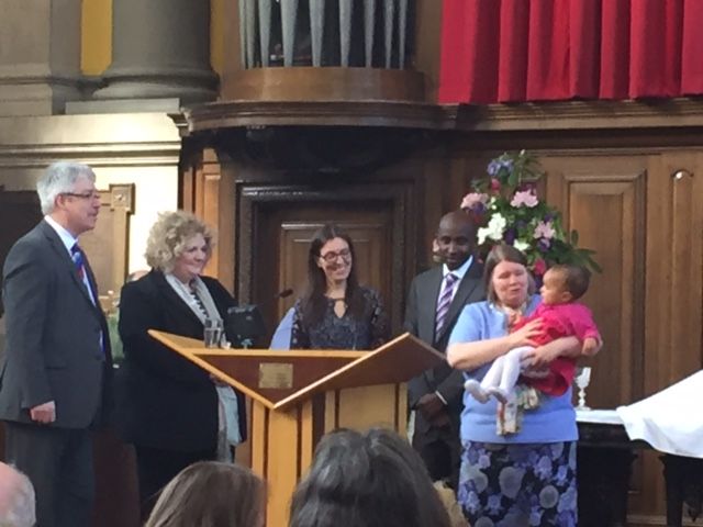 Phoebe enjoying her dedication blessing