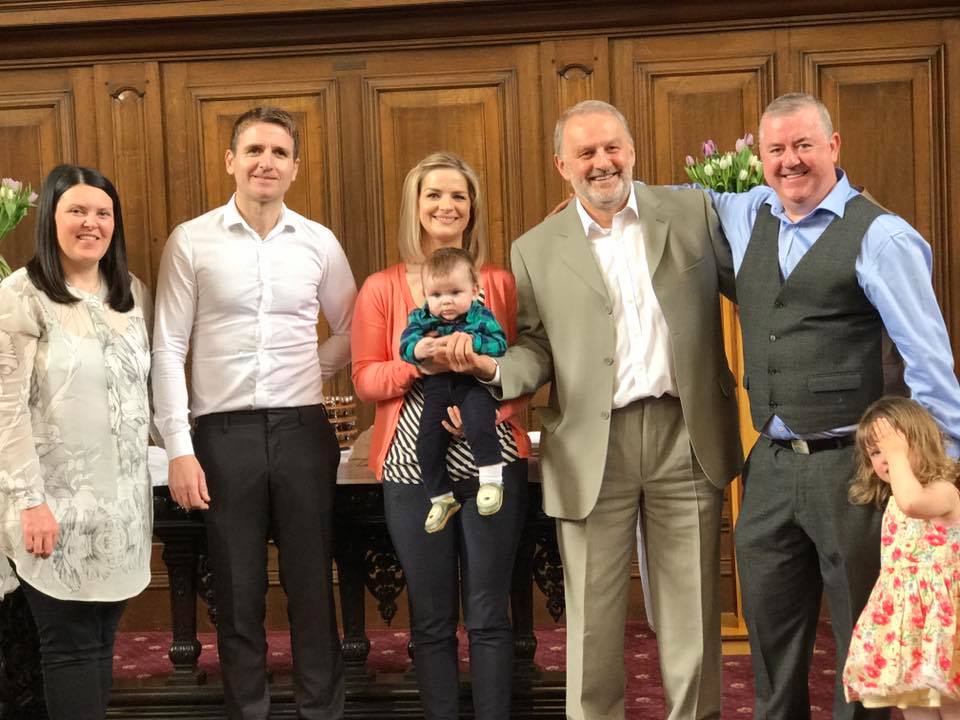 Samuel with his big sister, parents and Godparents