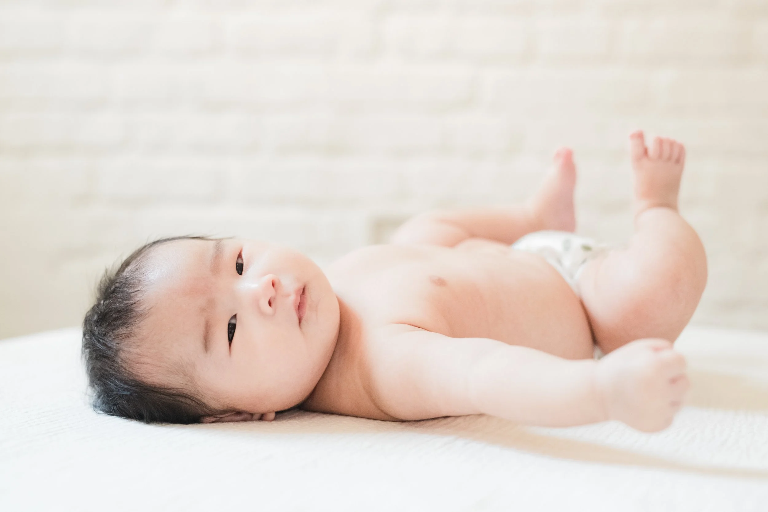 A gentle, light-drenched studio newborn session: Washington DC newborn photographer