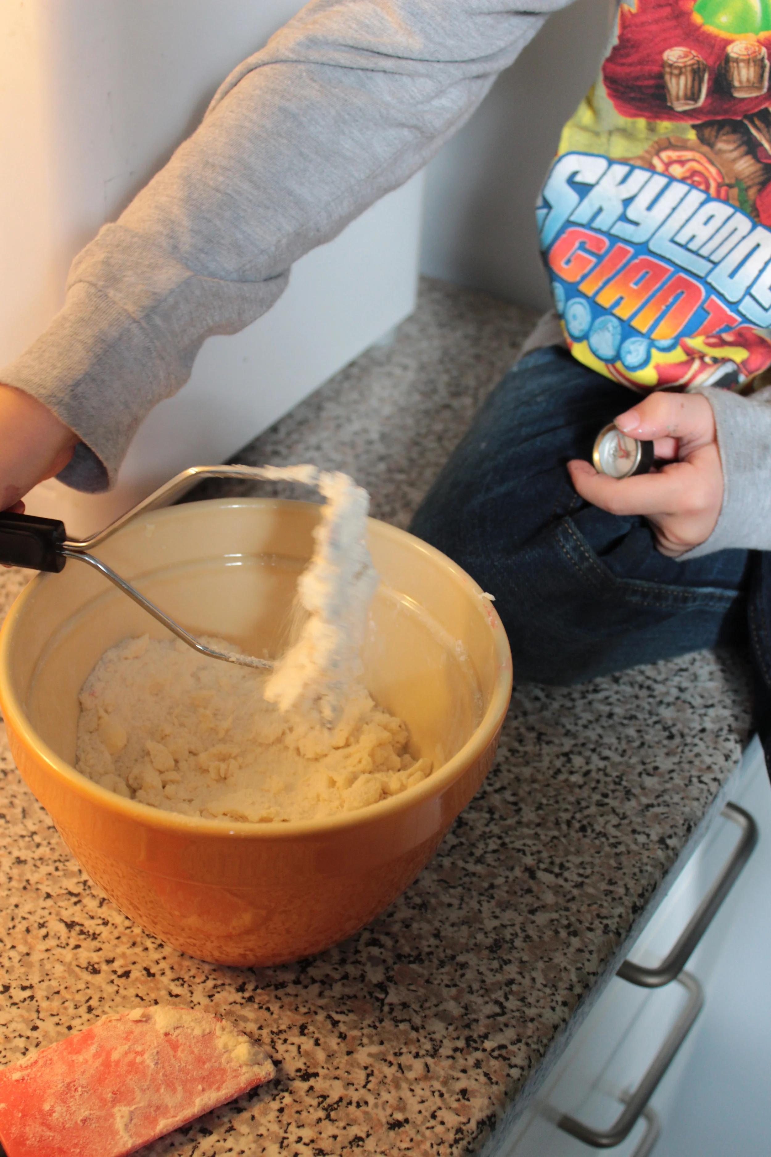 Potato masher used to achieve our crumble