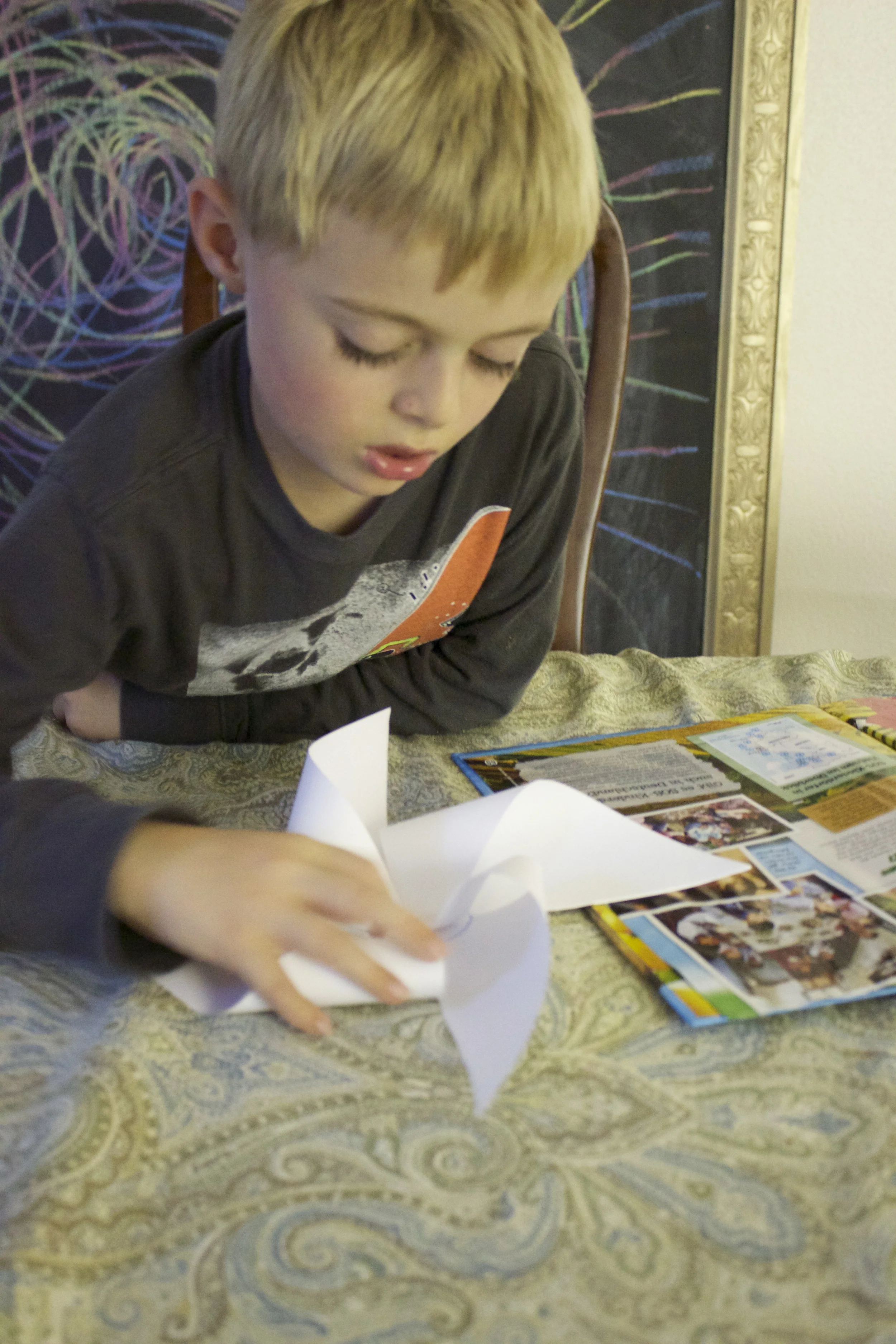 Folded and secured to the center.